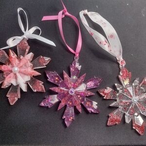 Set Of 3 Glittering Red, Pink and White, And Purplish Pink Snowflake Ornaments